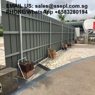 Outdoor area with a long gray fence and several planter boxes along a stone-paved path; overlay text shows contact email and a WhatsApp phone number: 'EMAIL US: sales@ssepl.com.sg' and 'PHONE/WhatsApp +65 83280194'.
