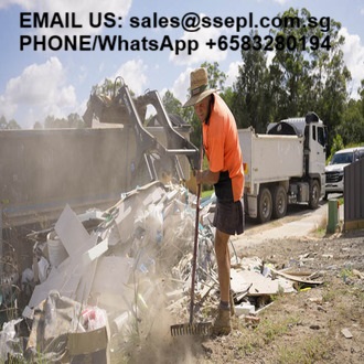 Construction worker in an orange shirt and hat sweeping trash at a landfill; contact info text is overlaid at the top of the image.