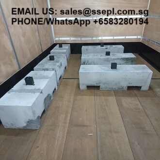 Concrete blocks with hollow cores loaded in a truck bed; overlaid contact text reads: EMAIL US: sales@ssepl.com.sg, PHONE/WhatsApp +65 83280194.
